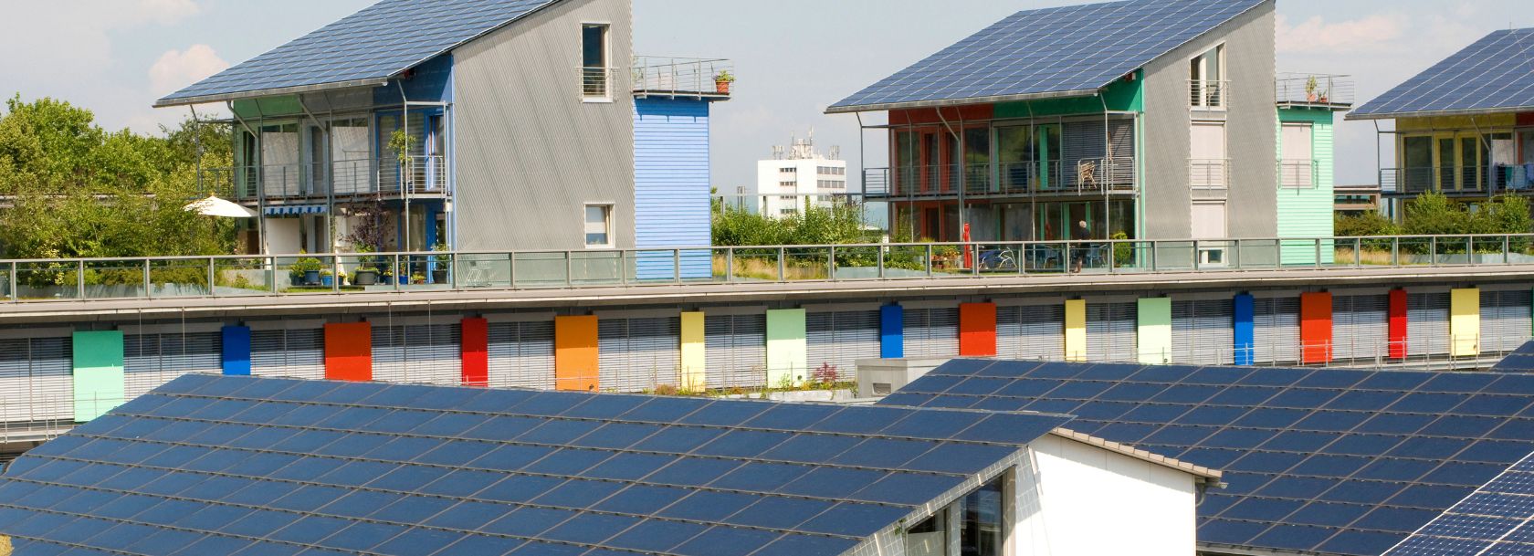 SOLAR VILLAGE, WITH PANELS COVERING HOUSE ROOFS