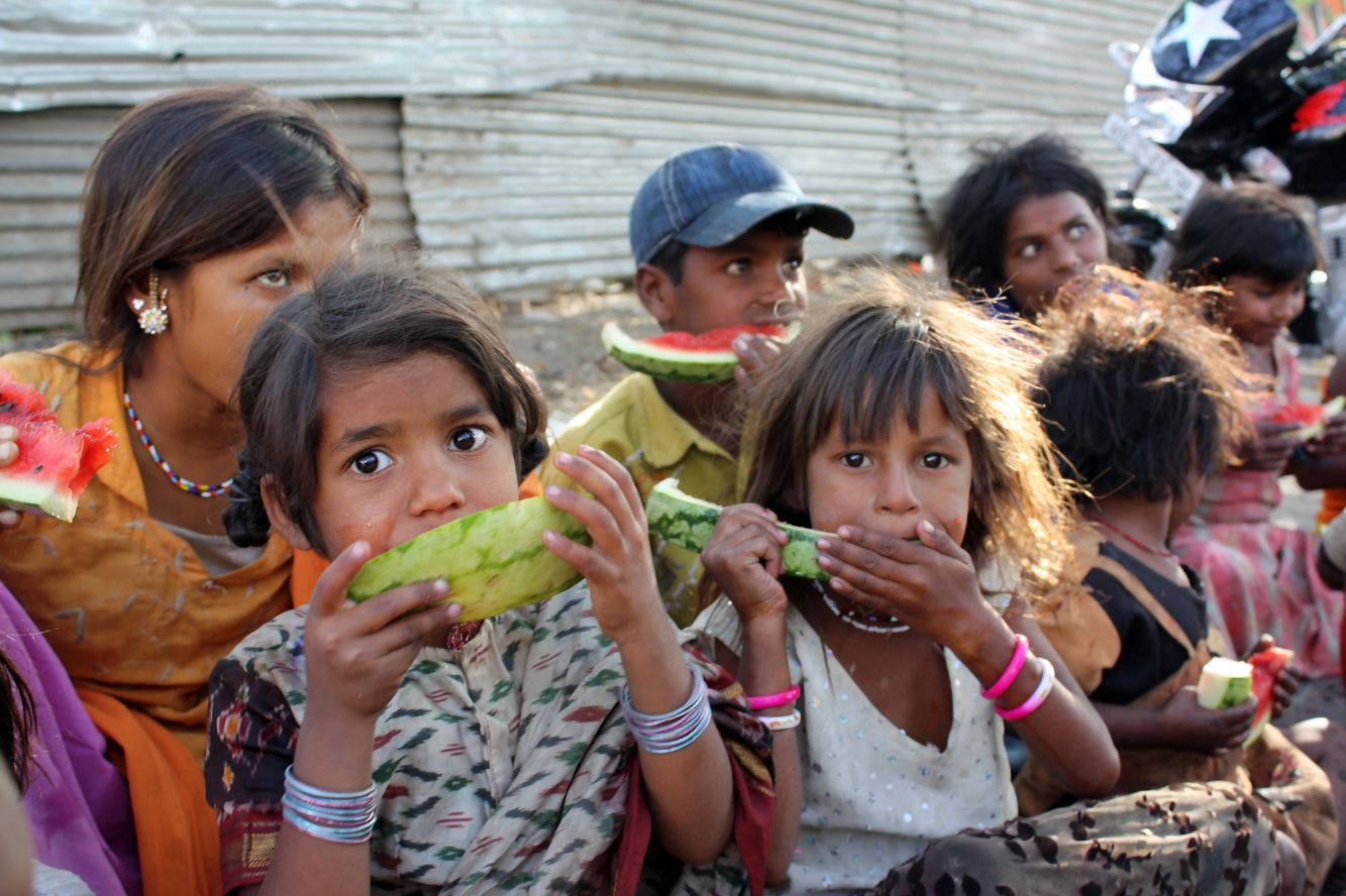 children eating watermelons