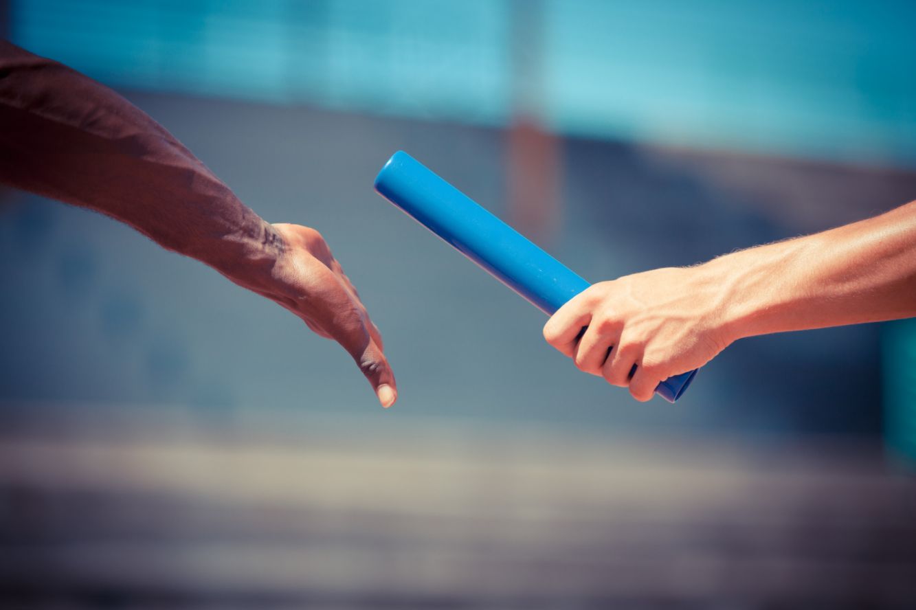 Baton being handed